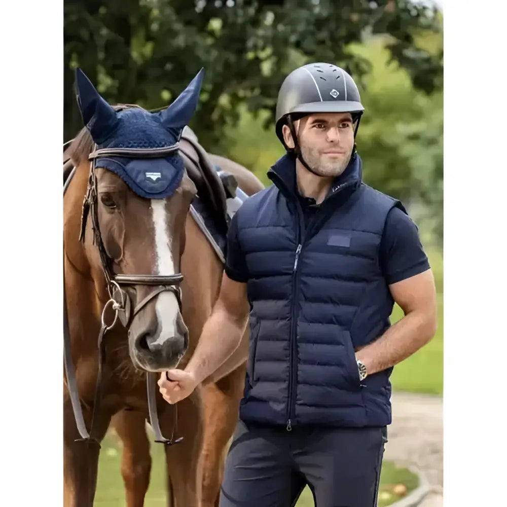 Navy blue quilted lemieux elite gilet with front zipper and side pockets made from dupont synthetic fibres for year round use