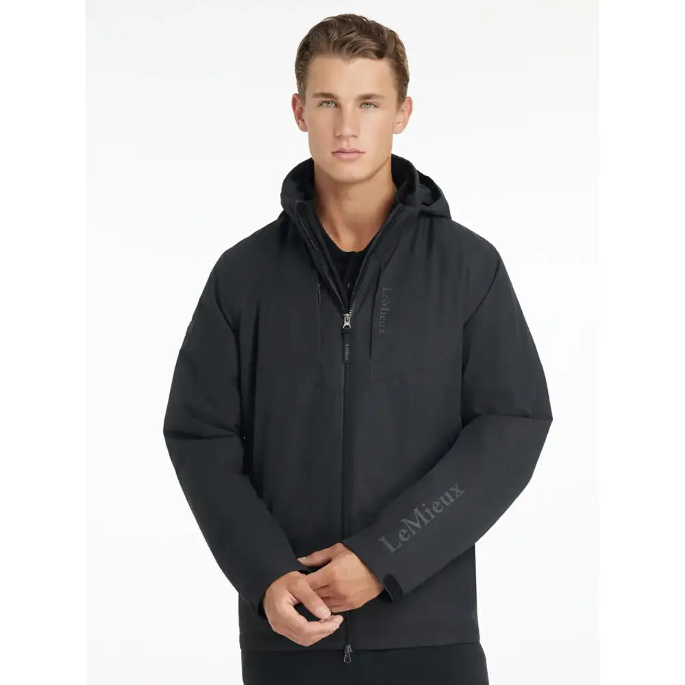 Black lemieux mens waterproof team jacket with zip-up hoodie and subtle logo on sleeve and zipper pull