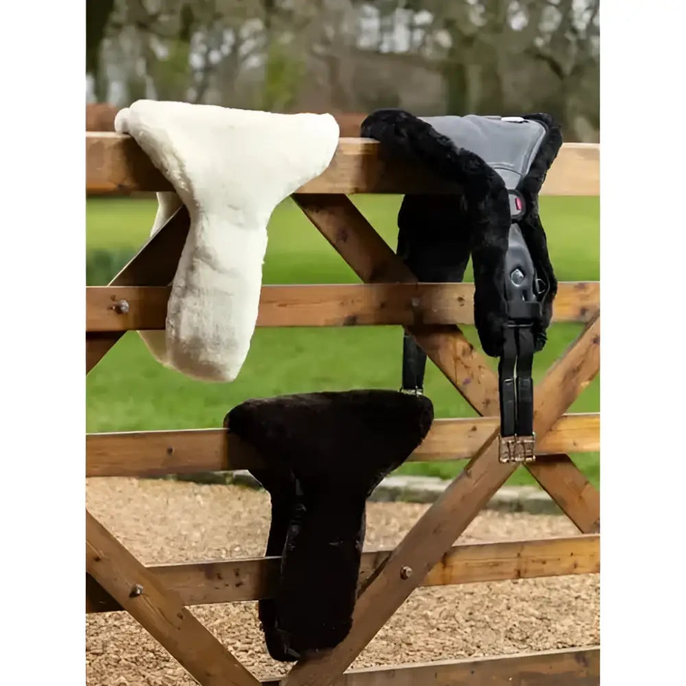 Black and grey LeMieux merino+ anatomic long stud girth cover natural with plush soft sheepskin texture
