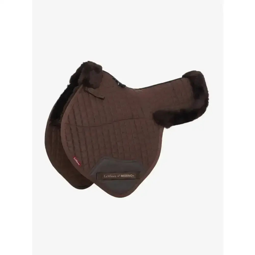 Brown quilted close contact numnah with plush dark brown fleece trim half lined close Merino+ label
