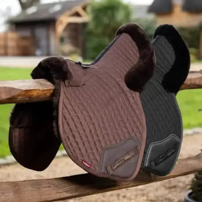 Brown and black quilted close contact numnah brown with plush fur trim and branded textured pattern on the side