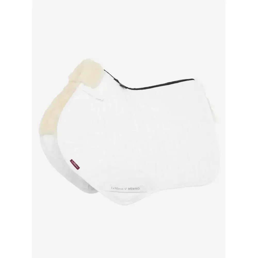 White leather horse saddle pad with cream fleece border and black zipper lemieux half lined close contact square natural