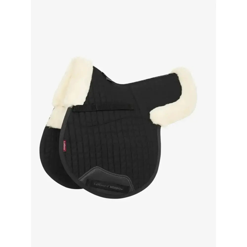 Black lemieux merino+ half numnah with cream fleece trim and red lambskin tag features soft dynamic wool design