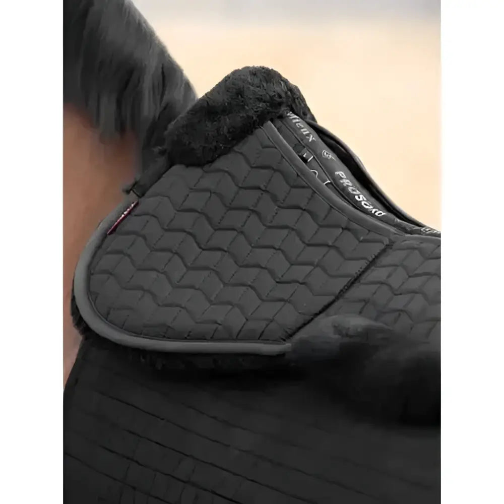 Black lemieux merino+ prosorb pocket half pad featuring quilted design plush fleece trim and subtle texture