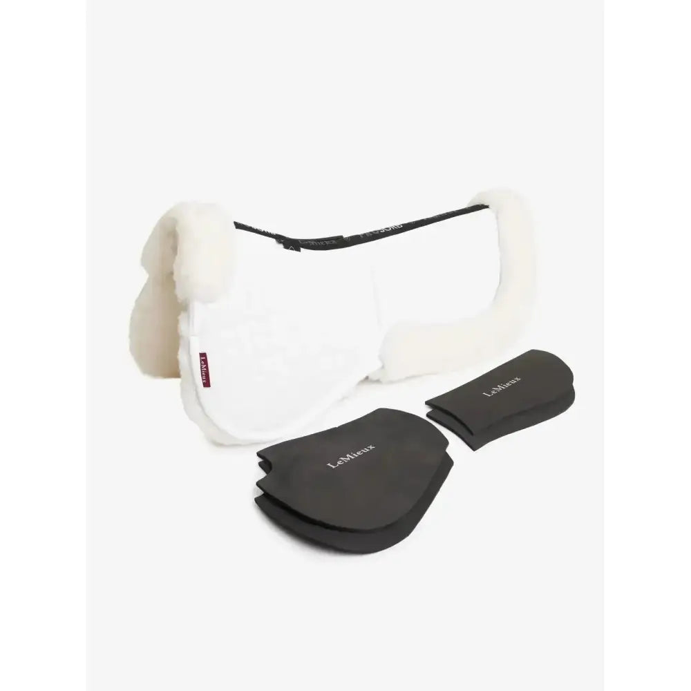 White lemieux merino+ prosorb pocket half pad with plush cream fleece trim and black protective inserts in white white