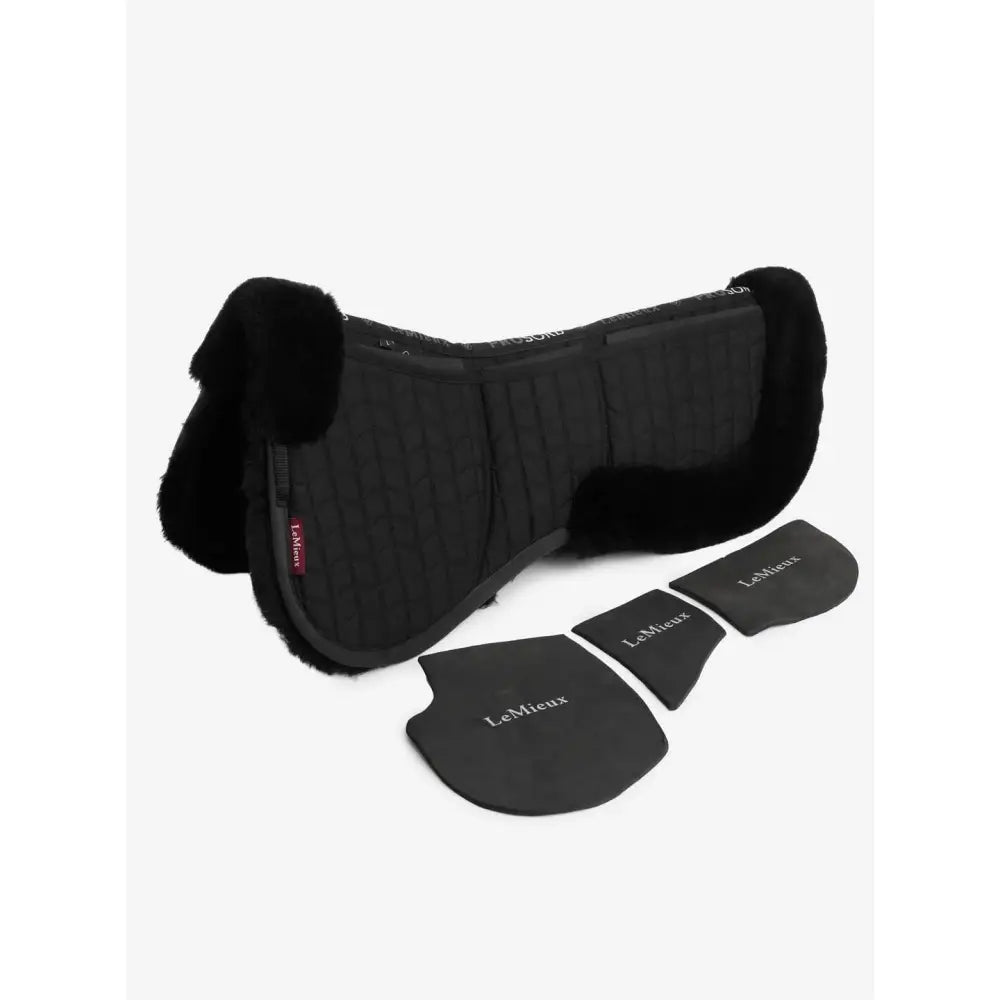 Black lemieux merino+ prosorb pocket half pad with plush fleece edges and three matching black insert pieces
