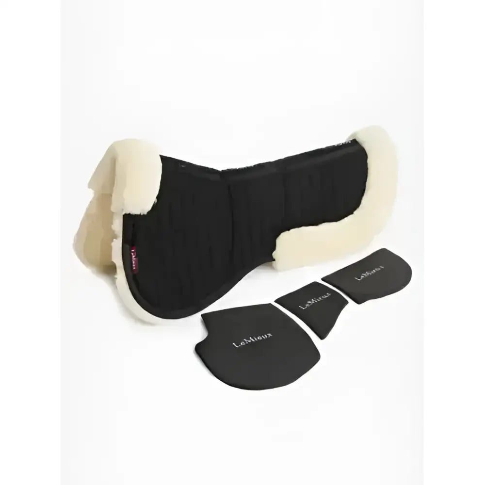 Black lemieux merino+ prosorb pocket half pad with cream fleece trim and three protective inserts in black natural