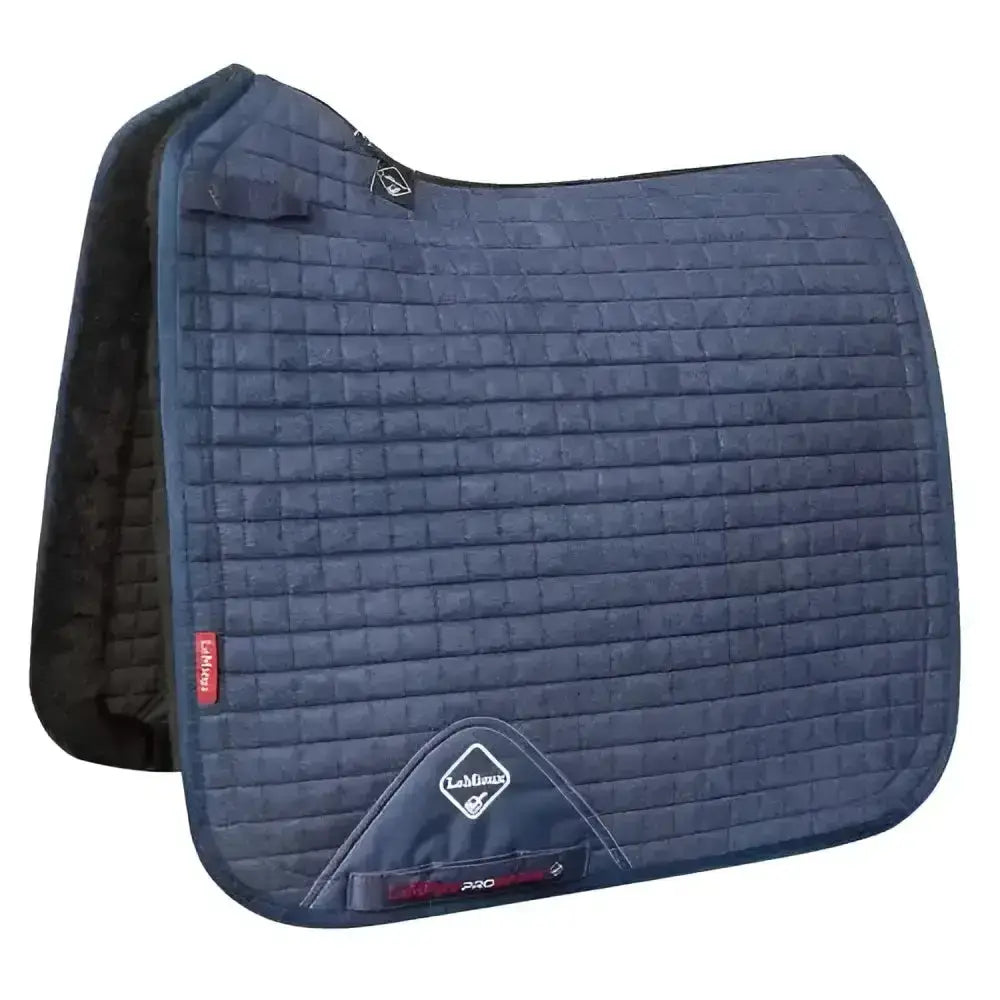 Navy blue quilted lemieux merino+ sensitive dressage square with diamond logo and red branding tags for sensitive skin dressage
