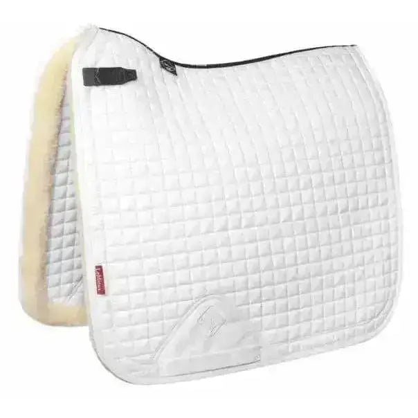 White lemieux merino+ sensitive skin dressage square with quilted cotton and soft cream fleece lining with black trim
