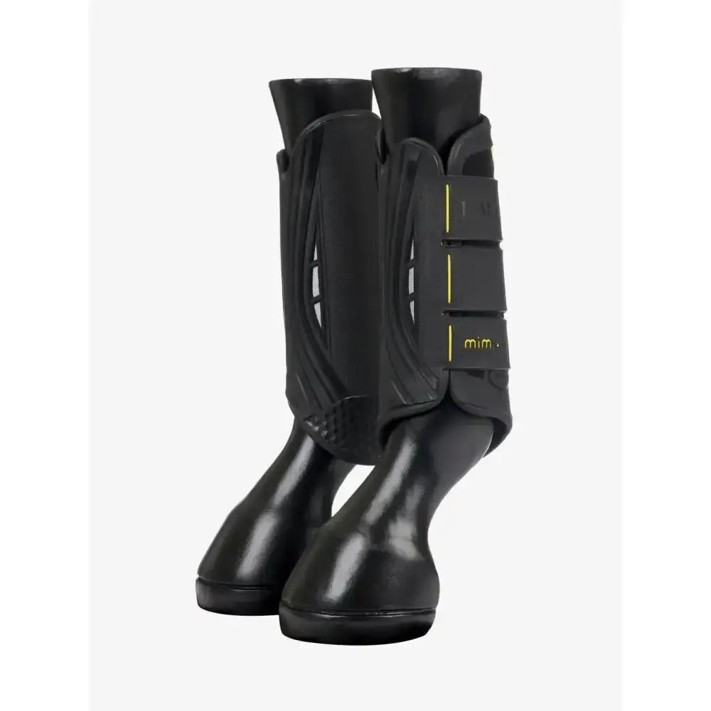 Black lemieux mimsafe xc boot hind with yellow stitching and adjustable straps for horse leg protection