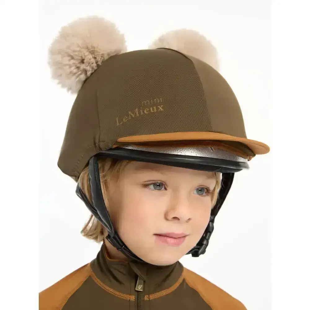 Olive green lemieux mini double pom hat silk alpine with tan faux fur pom-poms for equestrian use