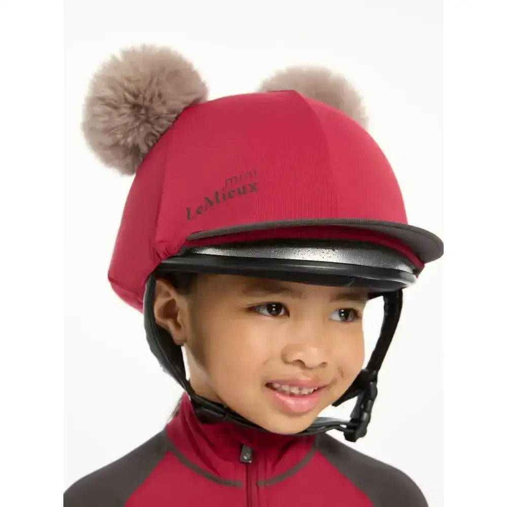 Red lemieux mini double pom hat silk ember equestrian helmet cover with fuzzy brown pom-poms on top