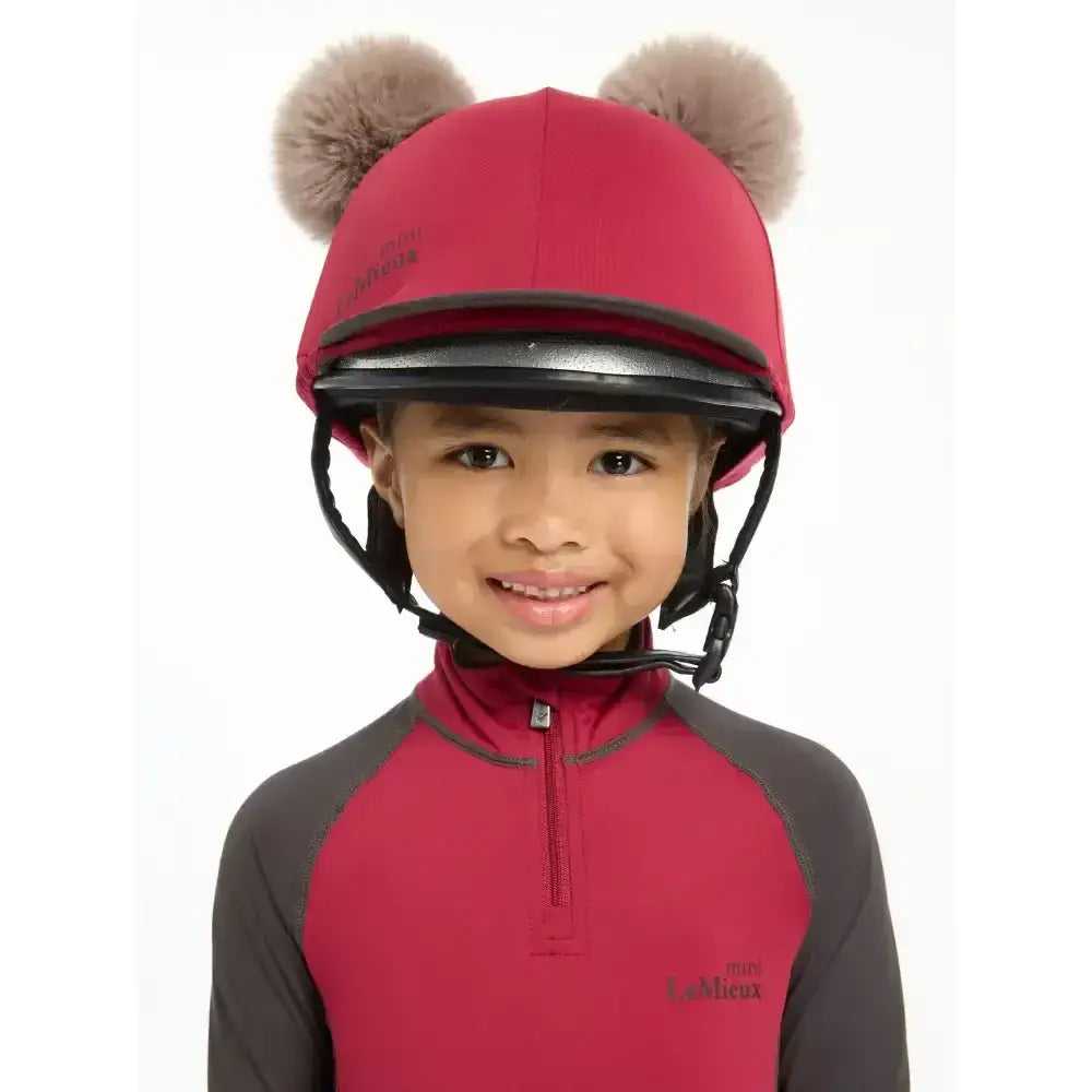 Red lemieux mini double pom hat silk ember equestrian helmet with fuzzy brown pom-poms on top