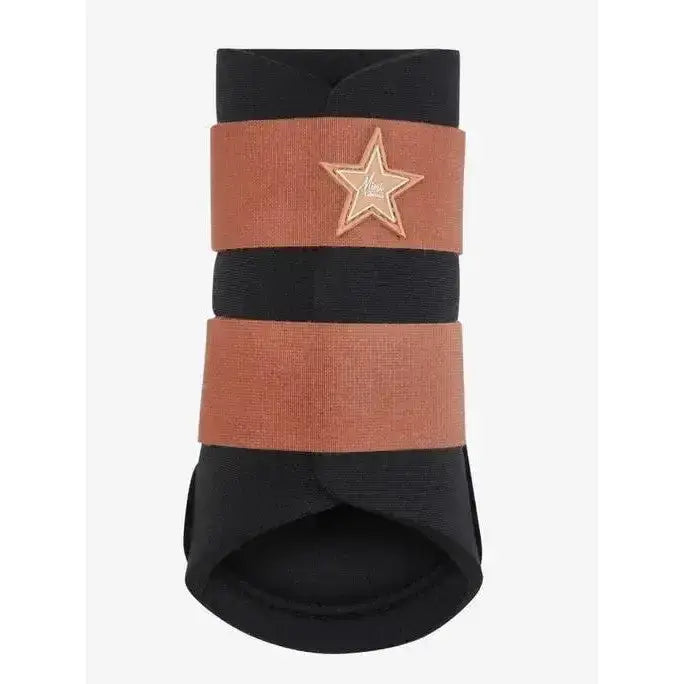 Black and rust striped mini grafter boots apricot by lemieux with gold star emblem on hoof protector