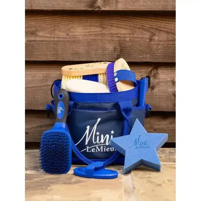 Blue lemieux mini grooming kit bag open with assorted brushes and tools grooming set benetton blue