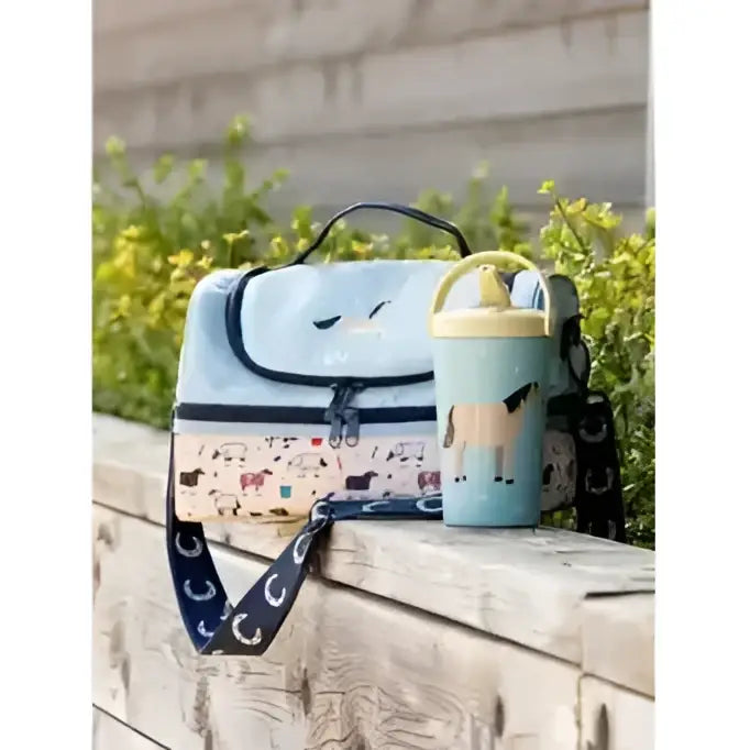 Light blue insulated lemieux mini holdall aqua with playful horse pattern and black zippers and handles
