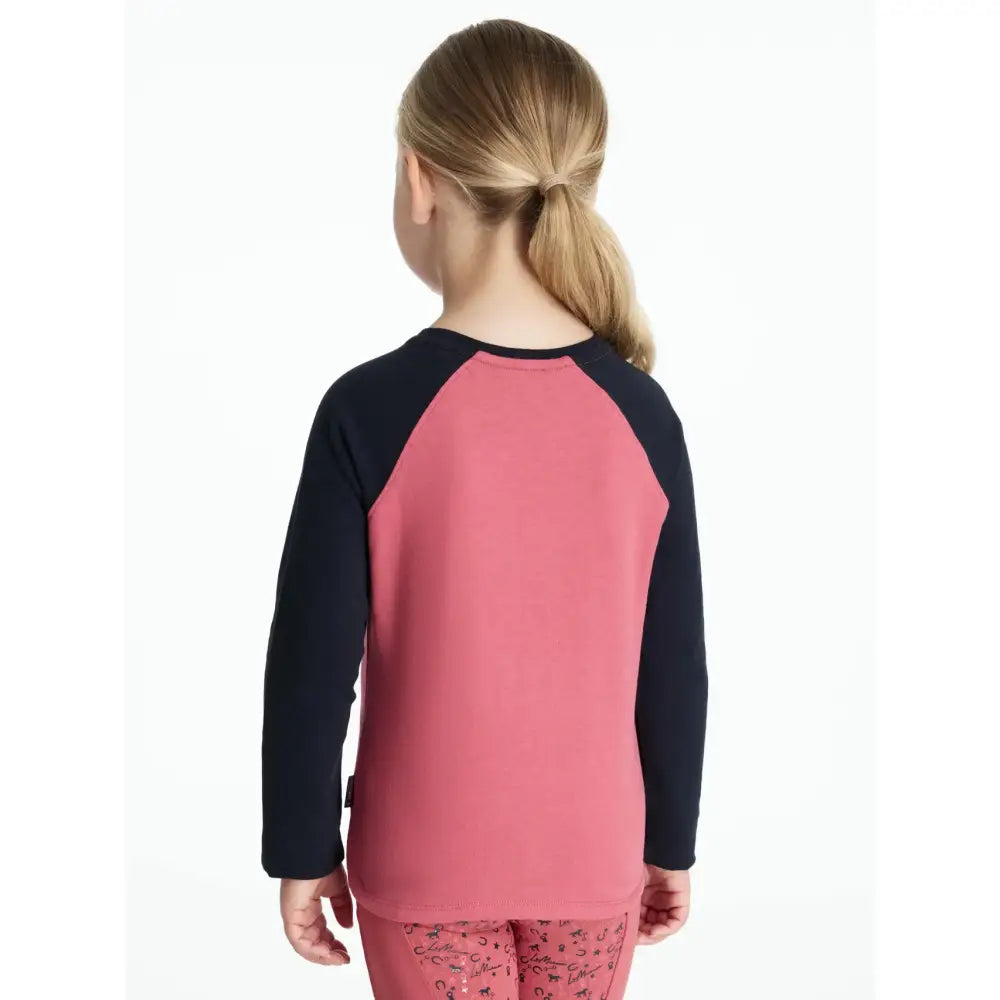 Pink and black lemieux mini jamie chancer long sleeve top with soft stretchy raglan sleeves in cranberry color