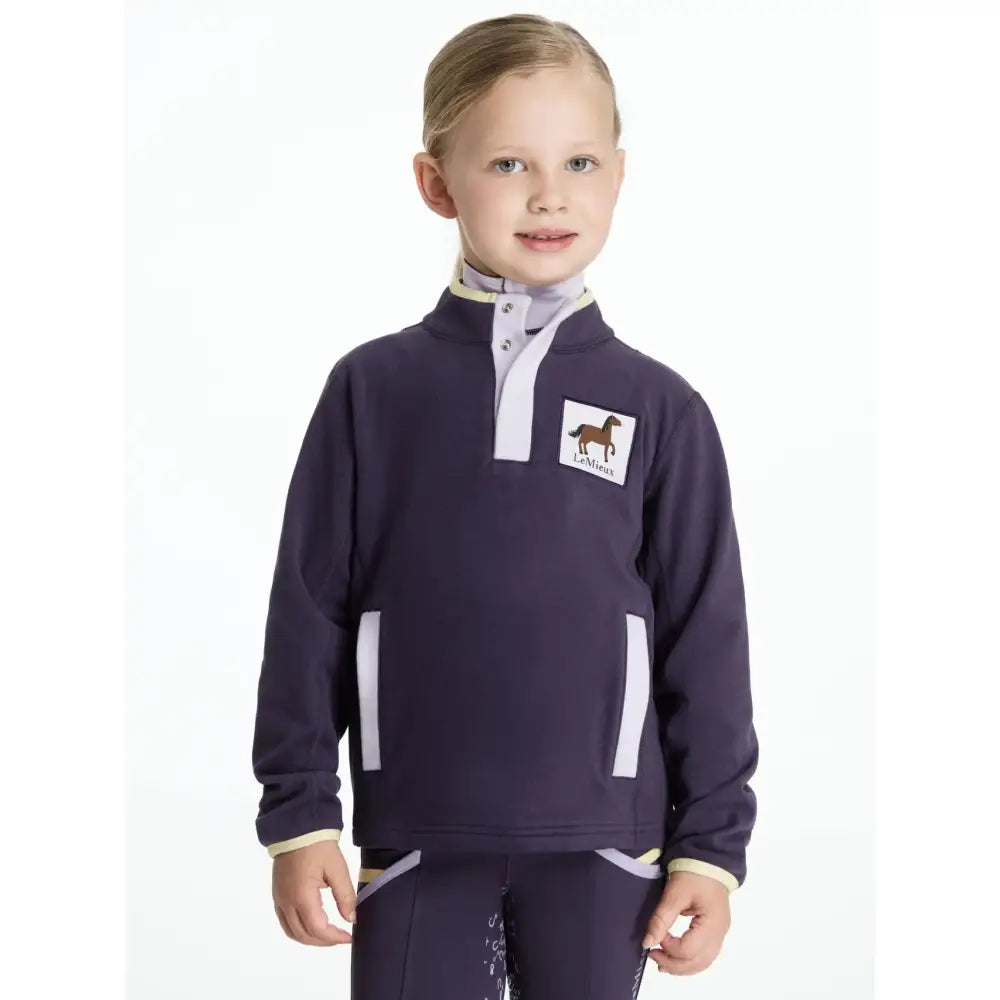 Navy blue lemieux mini mae popper fleece jacket with white trim and horse logo patch perfect for kids riding or casual wear