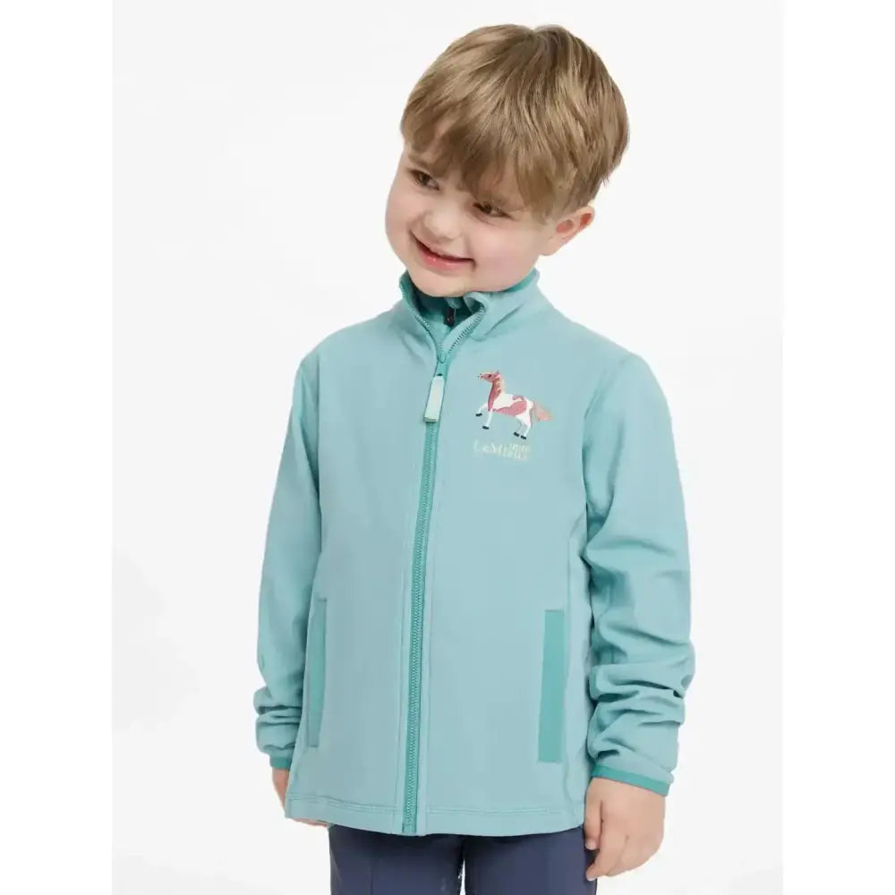 A child wearing a lemieux mini mari micro fleece aqua zip-up jacket in light teal with a small horse embroidery on chest