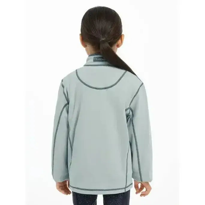 Light gray lemieux mini mari micro fleece glacier jacket with dark gray stitching and subtle brand tag at the collar