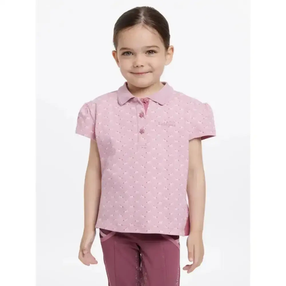 Pink lemieux mini polo shirt blossom with subtle pattern and matching star buttons on the collar