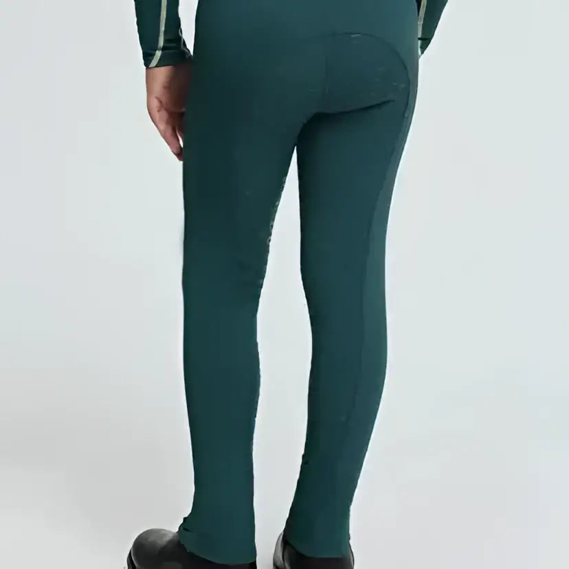 Dark green form-fitting lemieux mini pull riding pants with white elastic waistband and mieux emir branding