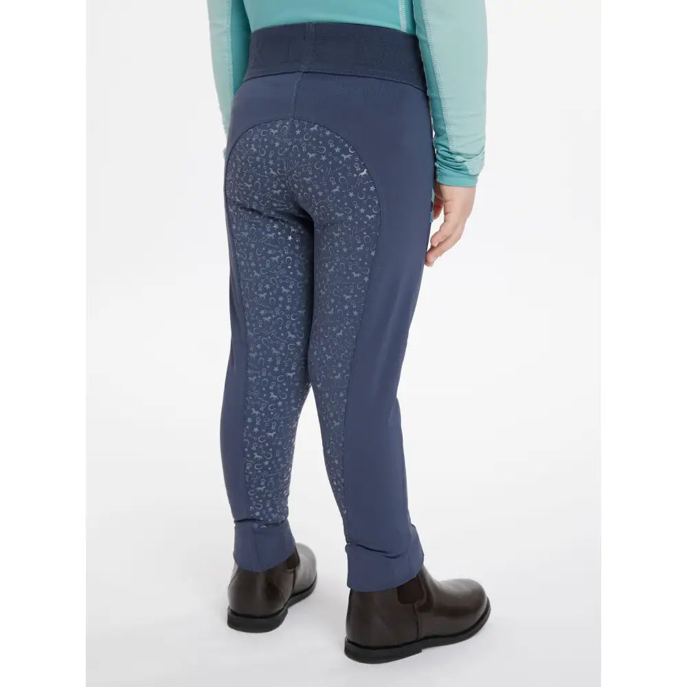Back view of navy blue lemieux mini pull ons with subtle white paisley pattern on the back panels pull ons dusk blue