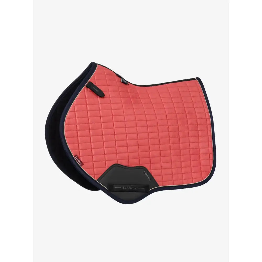 Coral quilted lemieux mini suede close contact saddle pad with black trim and branded accents in cranberry