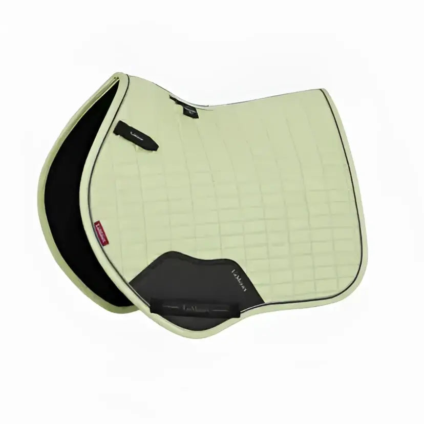 Light green lemieux mini suede square macaron saddle pad with black accents soft inner lining and high wither cut