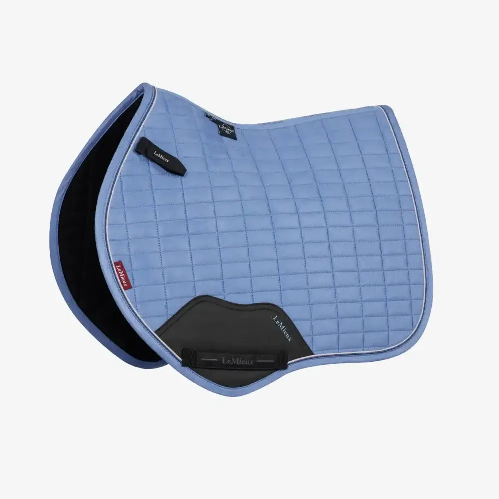 Light blue quilted lemieux mini suede saddle pad with black accents and soft padded interior for close contact use