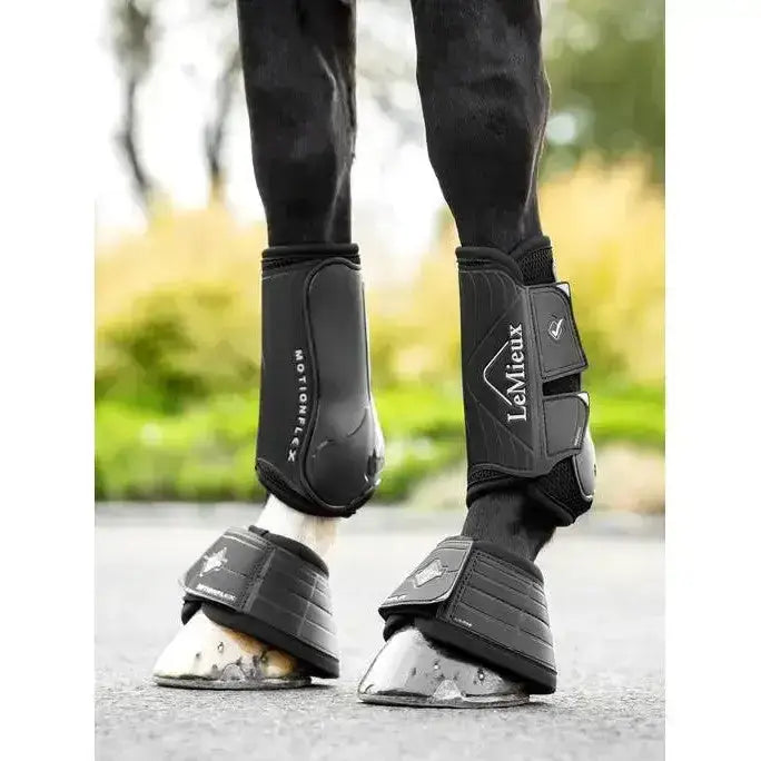 Black lemieux motionflex dressage boot with adjustable straps and flexible design for sleek leg protection