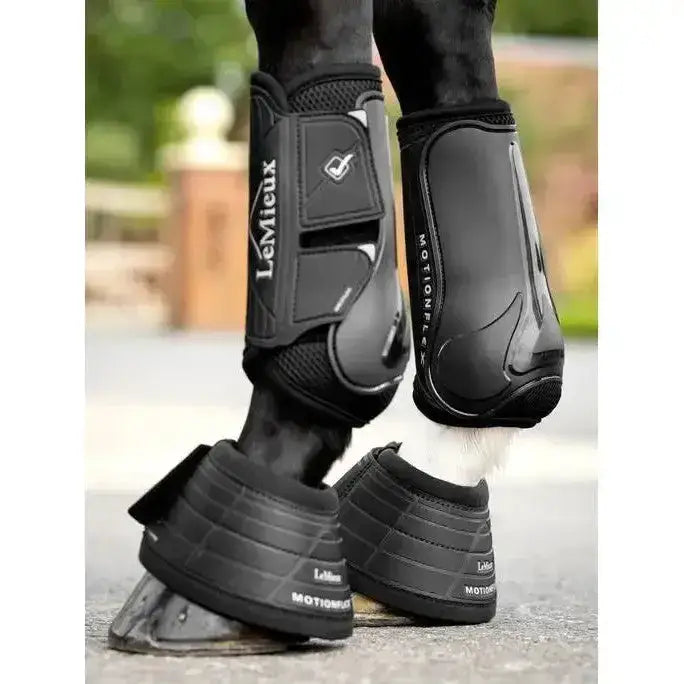 Black lemieux motionflex dressage boot with glossy finish and breathable mesh panels for flexible motionflex dressage