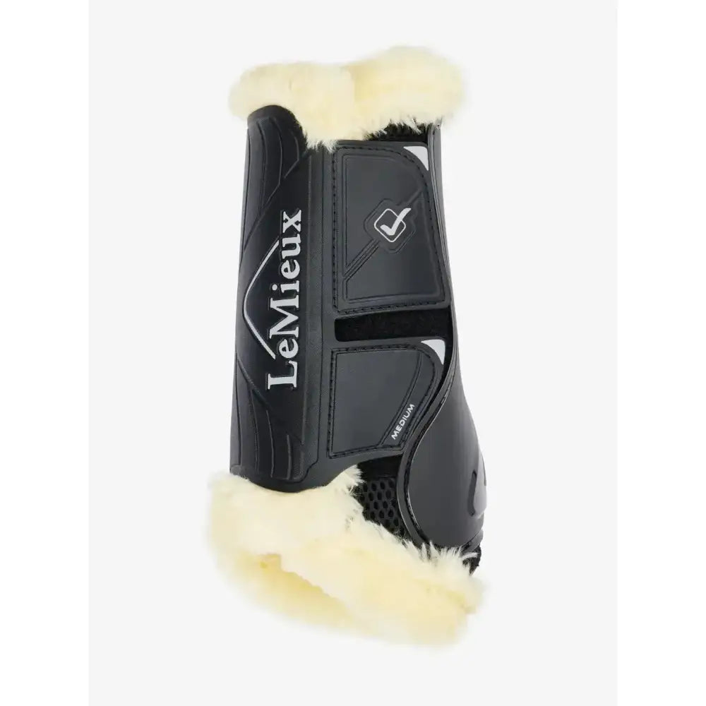 Black lemieux motionflex dressage boot with cream fleece edge black natural and medium size label visible