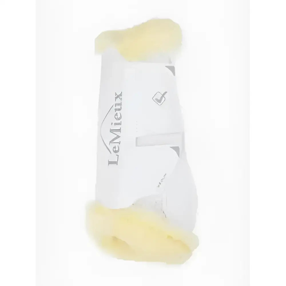 White lemieux motionflex dressage boot with yellow fleece edge and plush trim perfect for rigid schooling boots