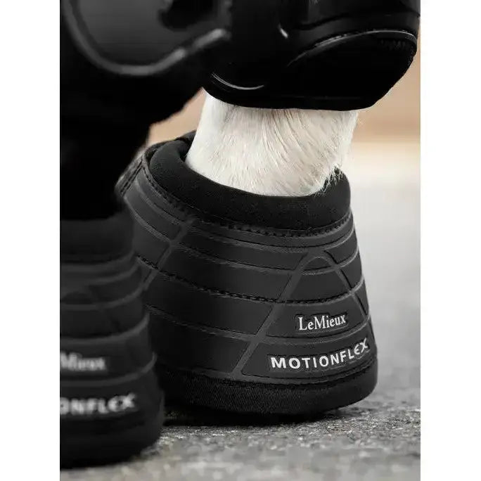 Black lemieux motionflex reach boot with textured reinforced design for extra protection and durability in reach boot black