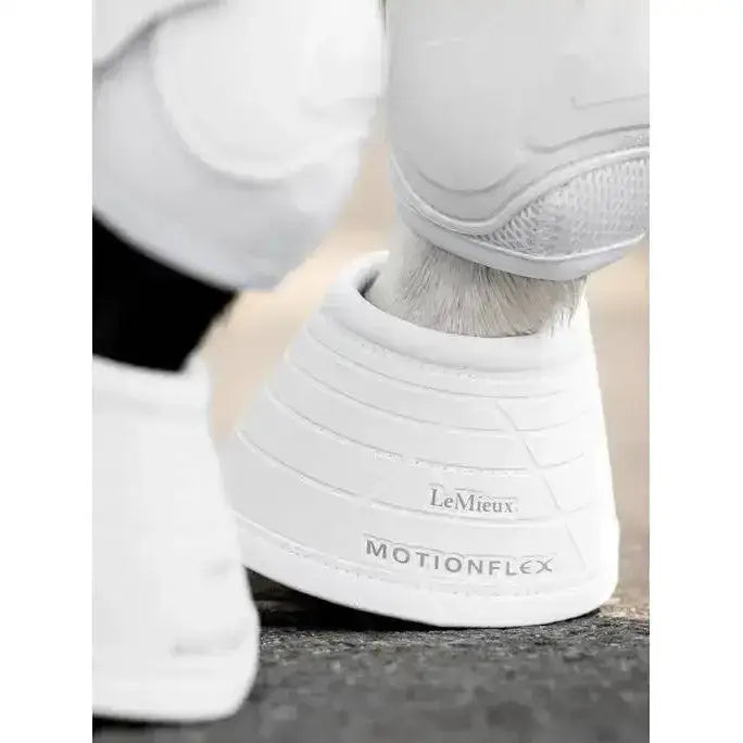White lemieux motionflex reach boot white with ribbed texture and subtle branding for overreach protection