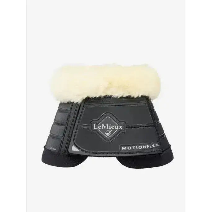 Black lemieux motionflex reach boot with fleece edge black and cream sheepskin lining for horse hoof protection