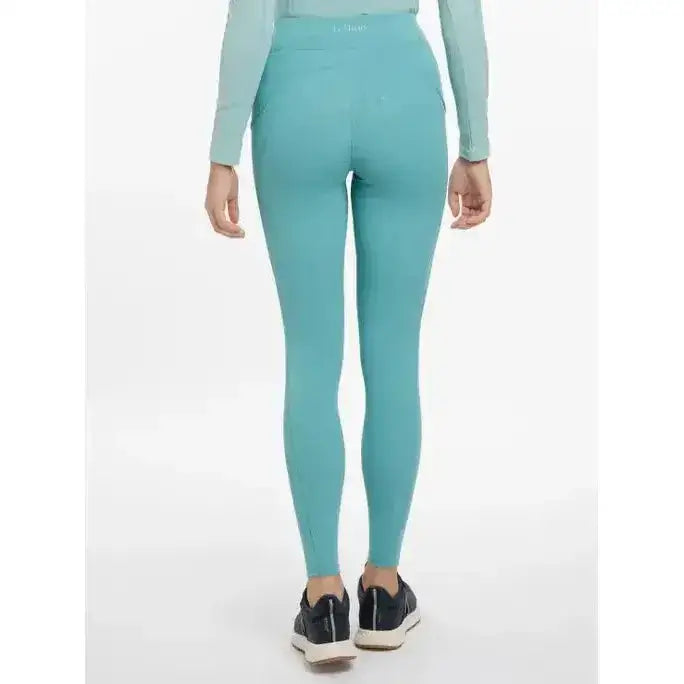 A pair of teal lemieux naomi pull high-waisted leggings with a snug fit and subtle waistband branding