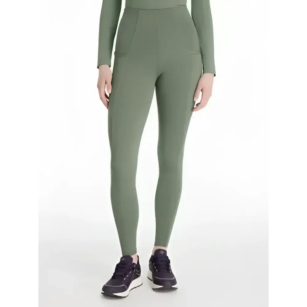 Olive green high waisted lemieux naomi pull leggings with side pockets perfect for everyday wear