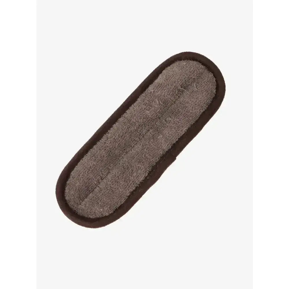 Brown oval lemieux noseband pad with soft textured surface and dark brown border for comfort and durability