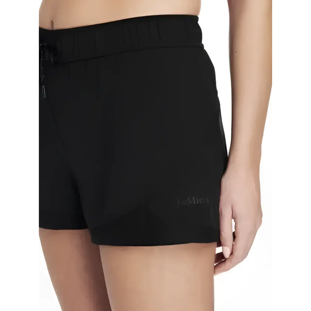 Black lemieux penny shorts with drawstring waistband and subtle branding perfect as shorts layer