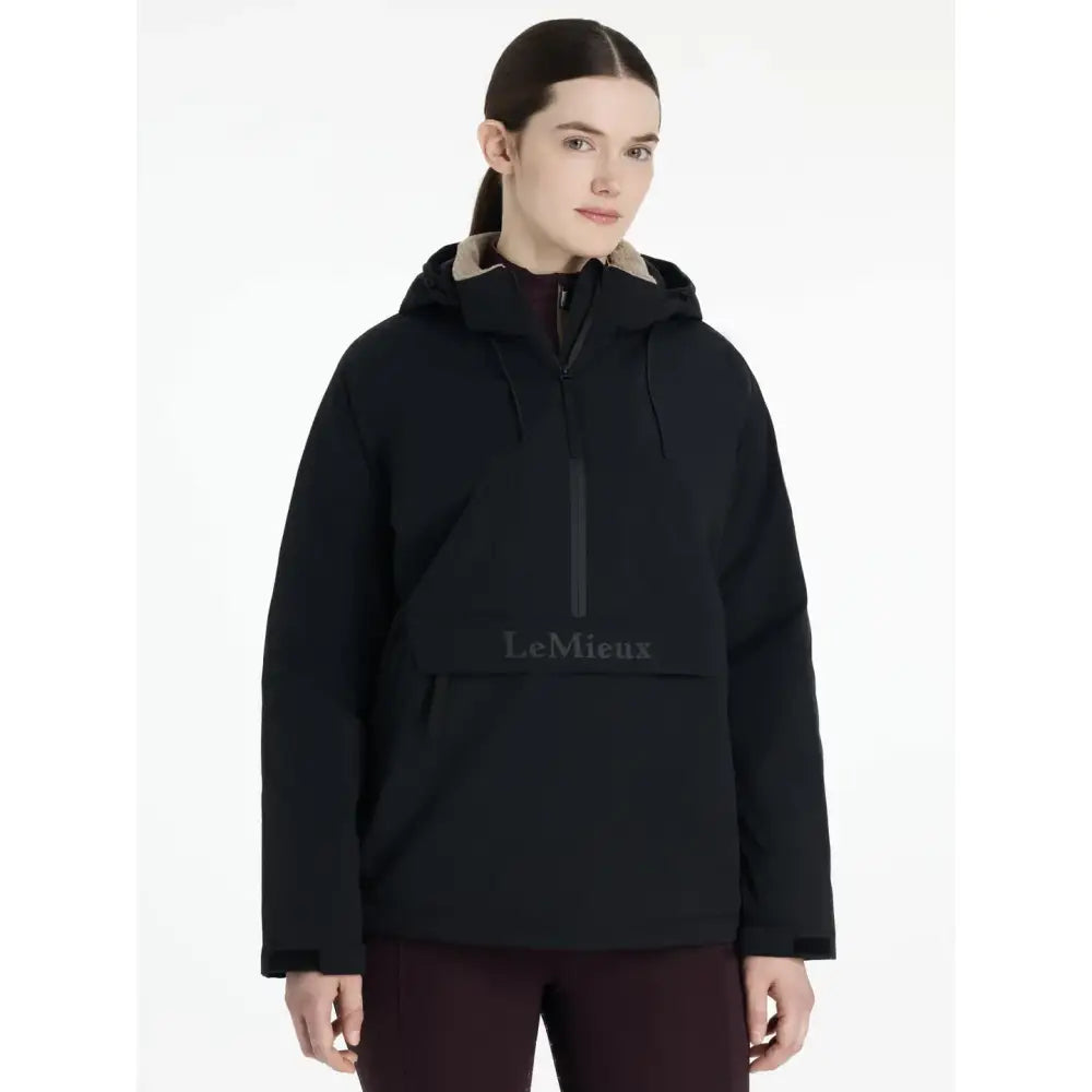 Black lemieux phoebe half zip waterproof anorak with hood and subtle gray branding for rainy weather use