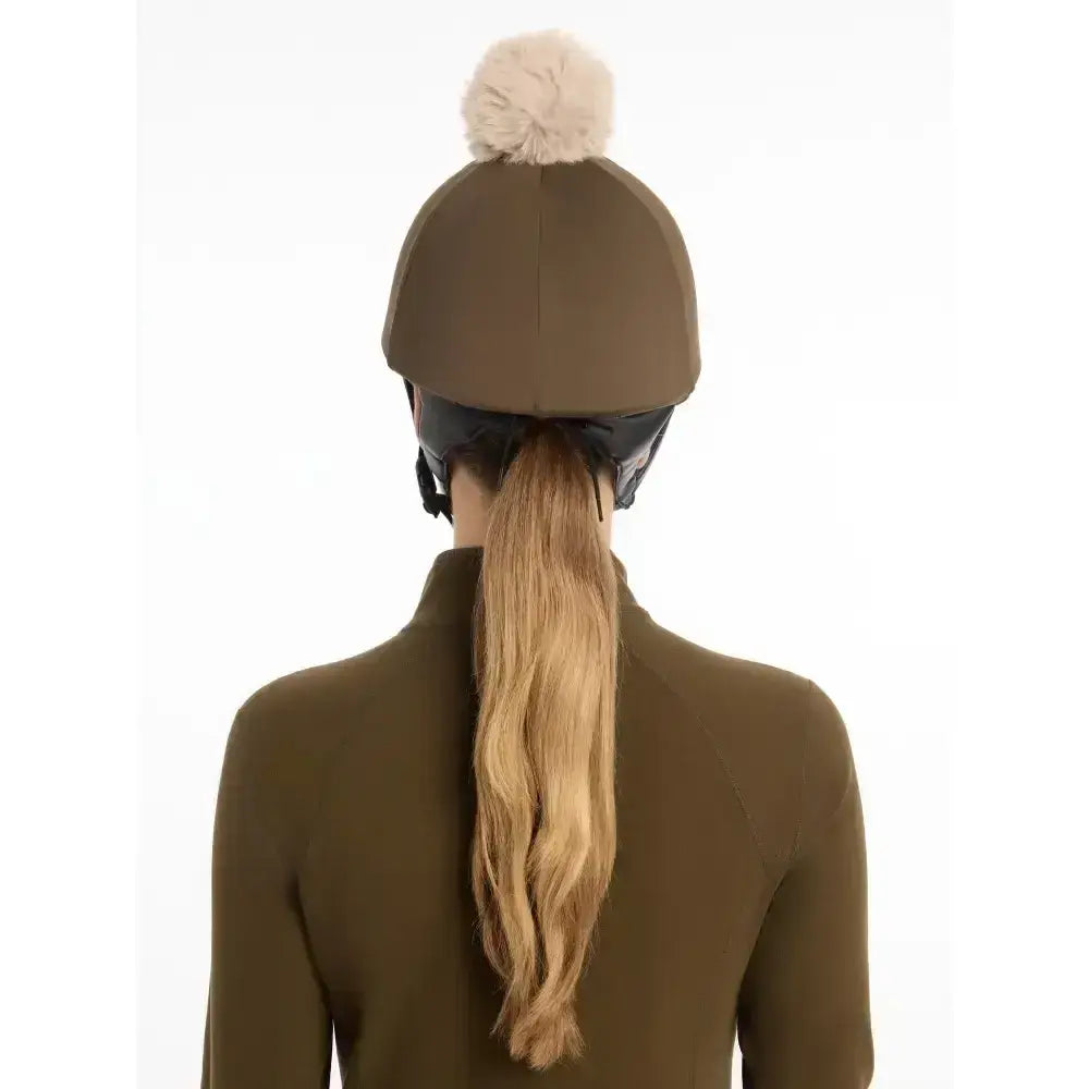 Brown lemieux pippa hat silk alpine equestrian helmet with fluffy cream pom-pom and silky smooth four-way stretch