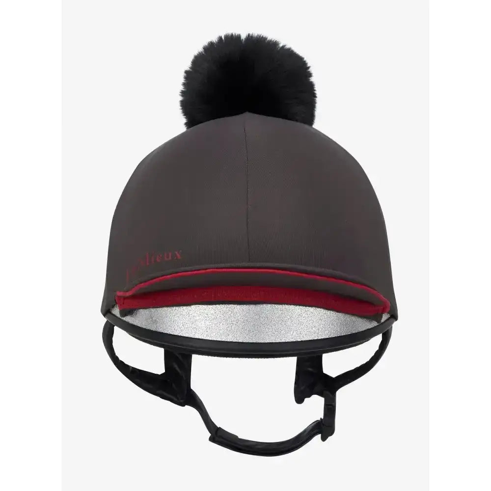 Gray lemieux pippa hat silk cinder with silky smooth four-way stretch, black faux fur pom-pom, red trim, and silver lining