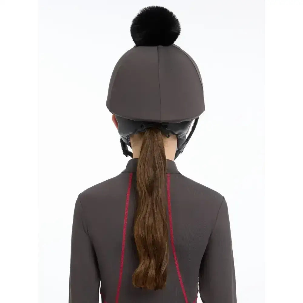 Gray lemieux pippa hat with black faux fur pom-pom made from silky smooth four-way stretch hat silk cinder material