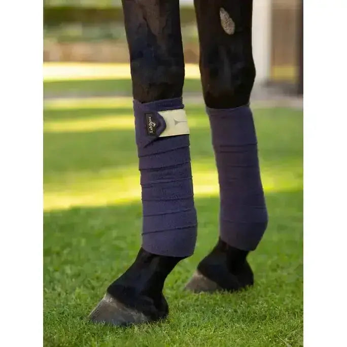 Navy blue elasticated lemieux polo bandages dusk with white lagardère label perfect for horse leg support