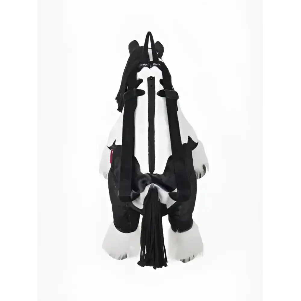 Black and white plush lemieux pony bag razzle with soft fur texture tassel details and bear-like ear straps
