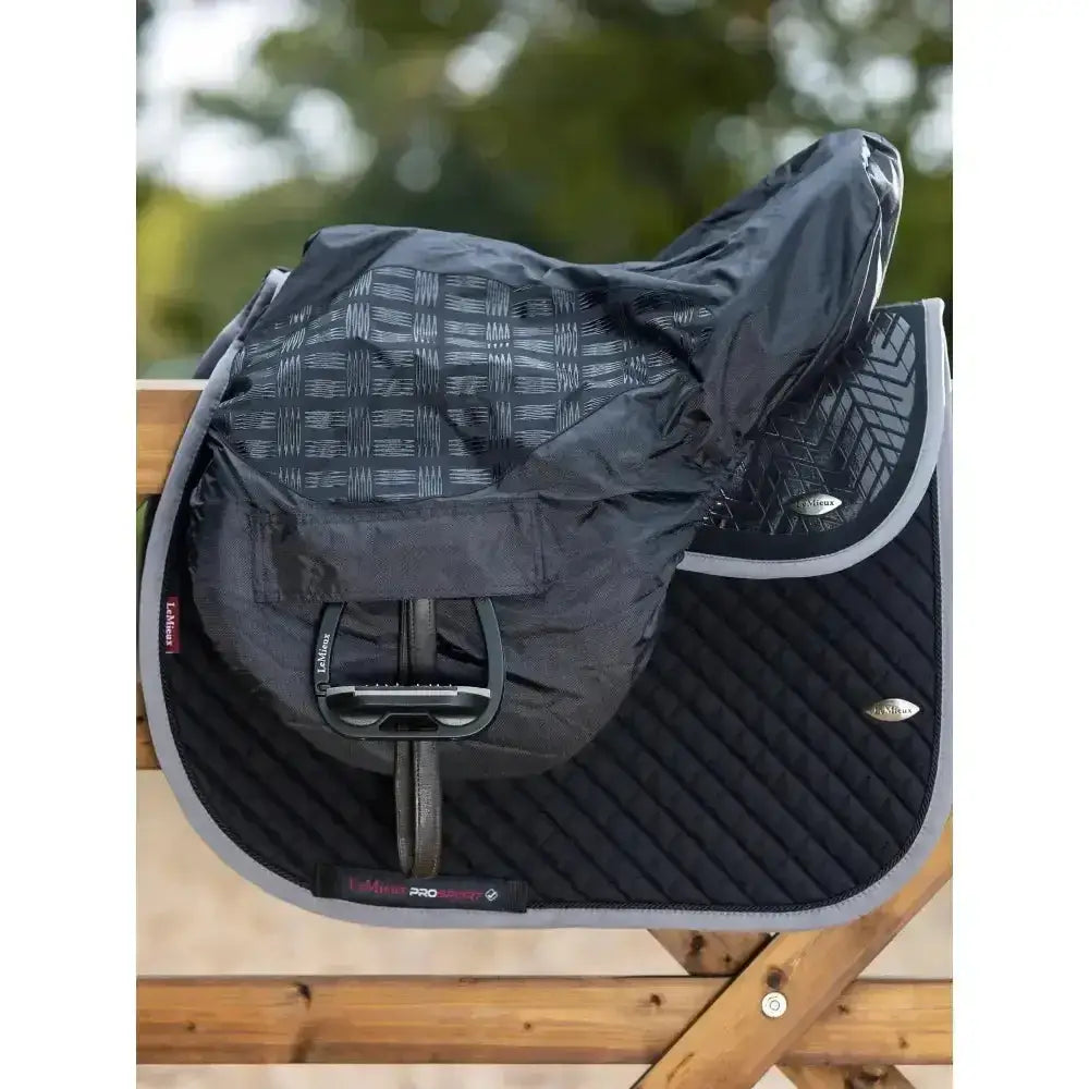 Black quilted lemieux pro-kit ride saddle pad with gray trim and matching cover featuring silicone grip seat for rider perfect stability