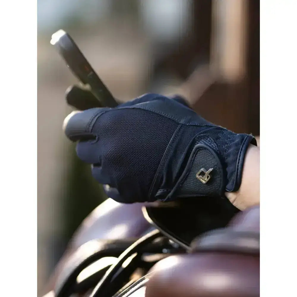 Dark blue lemieux pro mesh riding gloves lightweight with textured fabric and small metallic logo on the back wrist