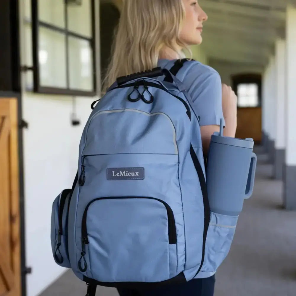 Light blue lemieux pro rucksack with black trim rucksack powder blue and side water bottle holder with hat holder